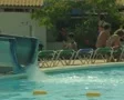 View of bottom of waterslide and poolside SD Footage