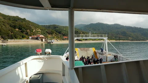 View of the bow of the ferry and passengers waiting for their arrival Stock Footage 252743013