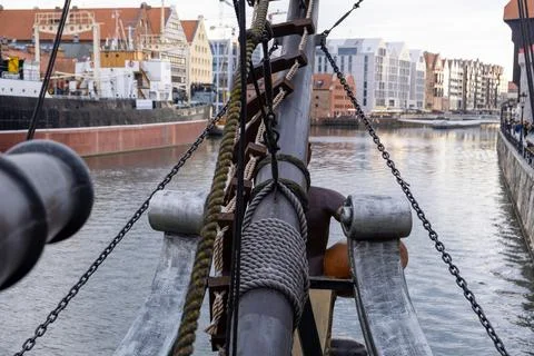 View from the bow of an old sailing ship with ropes and chains Stock Photos
