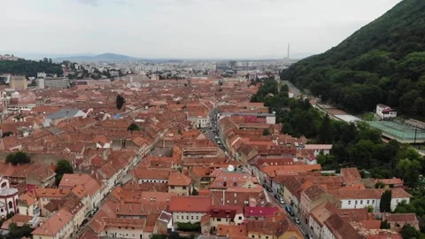 View on Brasov old city centre with red tile roof buildings Stock Footage 200953590