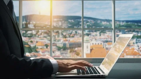 View of Bratislava Slovakia .Close up hand Businessman using laptop Stock Footage 84570049