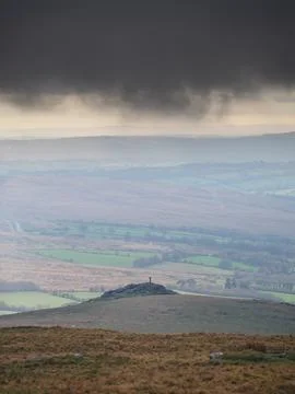 View to Brats Tor with Widgery Cross on top under storm clouds, Dartmoor UK Stock Photos