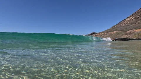 A view of a breaking wave at Sandy beach on the East side of Oahu. Stock Footage 252332233