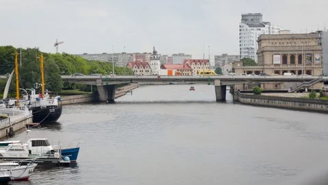 View of the bridge across the river at sunny summer day. Kaliningrad, Russia Stock Footage 84657293
