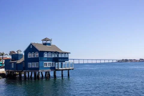 View of bridge and empty blue pier building Stock Photos