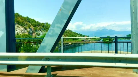 View of the bridge and river from the car window. Stock Footage 249730631