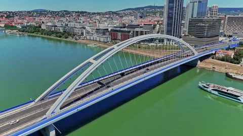 View of the bridge in Bratislava and river traffic on the Danube Stockbeeldmateriaal 337879011