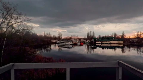 View from the bridge to the dock of the boats Stock Footage 125930922