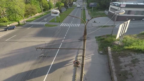 View from the bridge to the intersection with a pedestrian crossing, people pass Stock Footage 130195534