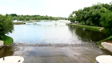 View of the bridge from the other side of the pond Stock Footage 55795657