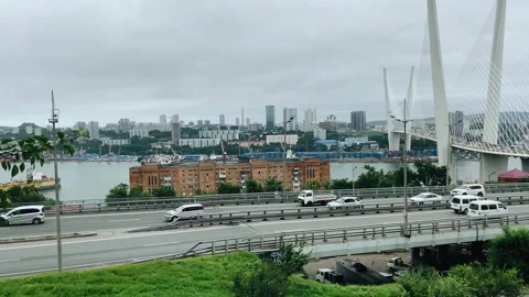 View of the bridge over the Gulf of the sea and the traffic on the overpass Stock Footage 282709821