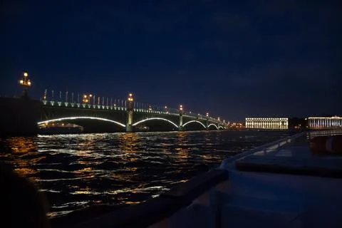 View of the bridge over the Neva river at night in St. Petersburg Stock Photos