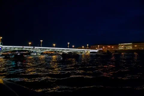 View of the bridge over the Neva river at night in St. Petersburg Stock Photos