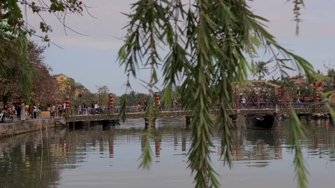 View of the bridge over the river in Hoi An Stock-Footage 128277193