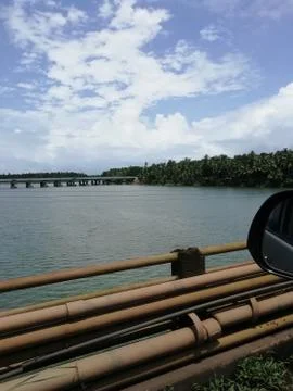 View of Bridge over the river with plants from a car Stock Photos
