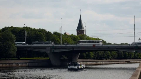 View of the bridge over the river. Tour ship sails. Kaliningrad, Russia Stock Footage 84656729