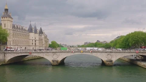 View of the bridge Pont au Change over the Seine River, island Ile de la Citу Stock Footage 310214998