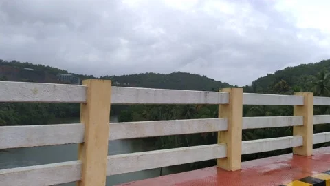 View of the bridge, river and mountains from inside the car Stock Footage 139129231
