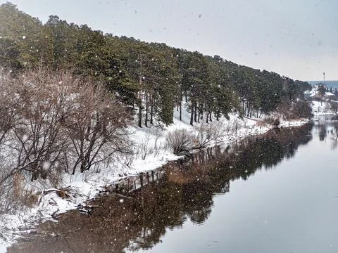 View from the bridge to the river in winter Stock Photos