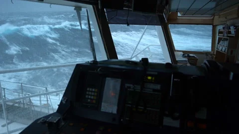 View from the bridge of the ship on the big waves. The ship is rocking hard 스톡 동영상 143670381