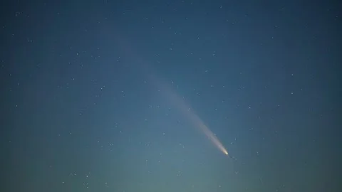 View of a bright comet in the night sky over Latvia. Stock Footage 340637952