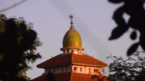 View of the brightly colored roofs and domes of the mosque. 스톡 동영상 292280707