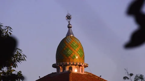 View of the brightly colored roofs and domes of the mosque. 스톡 동영상 292282560