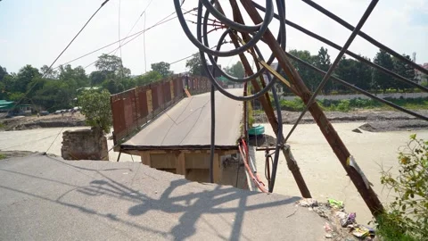 View of broken bridge due to flood water in India Stock Footage 321042168