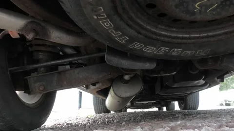 A View of a Broken Exhaust Pipe and Muffler Looking Towards the Front 库存影片 299730503