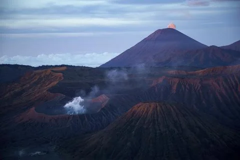 View of Bromo volcano on Java with panorama of volcanic landscape Photos
