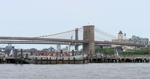 View of Brooklyn Bridge and Pier 11 / Wall St. Ferry Terminal in Manhattan Stock Footage 77745346