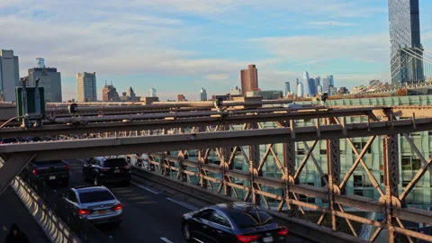 View from the Brooklyn Bridge to the road and skyscrapers of New York Stock-Footage 234088802