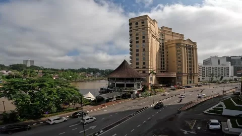 View of Brown Building Near a river with Road and Traffic. Stock Footage 259128101