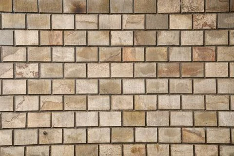 View of a brownish brick wall with different shades and patterns for a Foto stock