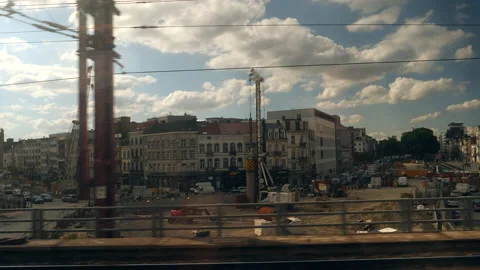 View of Brussels center under construction from a riding train window. Belgium. Stock Footage 217922976