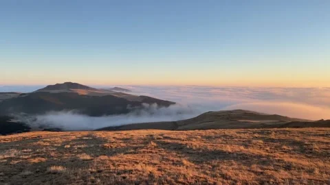 View of Bucegi Mountains with dense fog Stock Footage 166363659