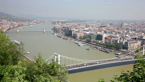View of Budapest: chain Secheni Bridge through the river Danube and Parliament Video stock 98994105