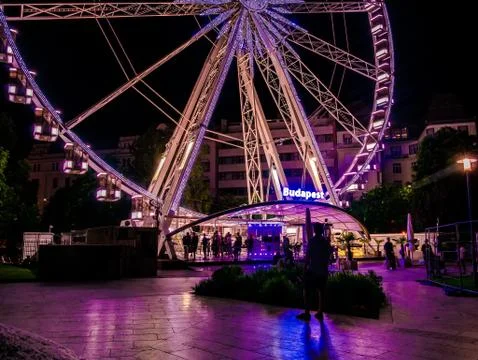 View on the Budapest Eye ferris wheel and the people on Elisabeth square in B Stock Photos