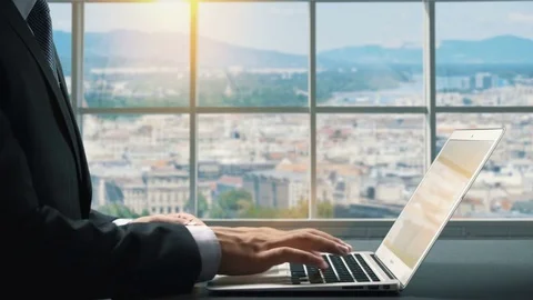 View of Budapest Hungary .Close up hand Businessman using laptop Stock Footage 84575286