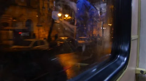 View at Budapest streets through the window of a tram, by night, 4K Stock Footage 44612572