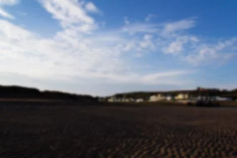 View of Bude in Cornwall from the beach Out of focus. Stock Photos