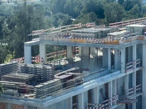 View of building construction site in downtown area. Stock Photos