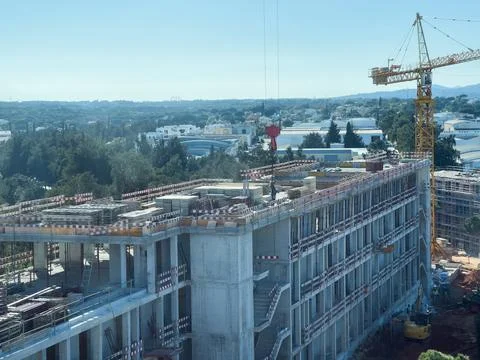 View of building construction site in downtown area. Stock Photos