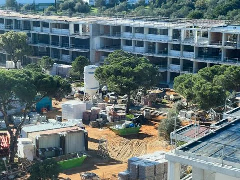 View of building construction site in downtown area. Stock Photos