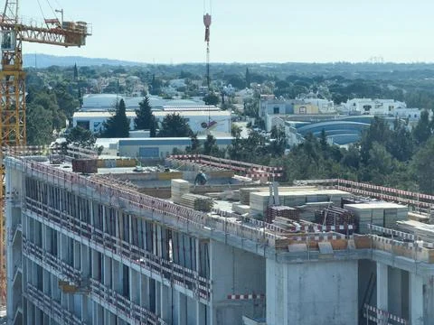 View of building construction site in downtown area. Stock Photos