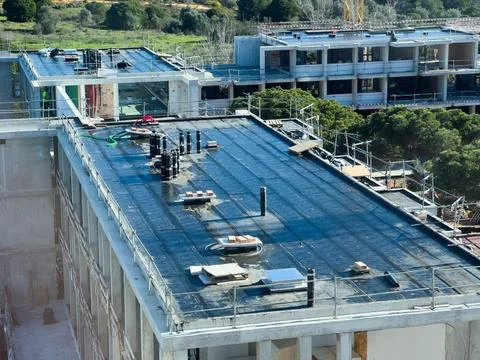 View of building construction site in downtown area. Stock Photos
