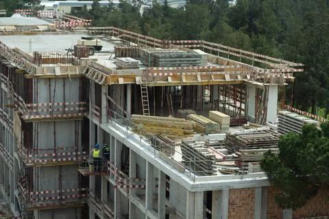 View of building construction site in downtown area. Stock Photos