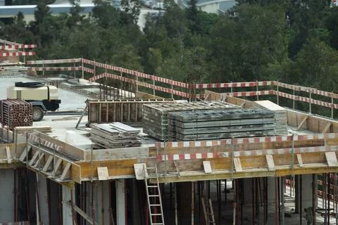 View of building construction site in downtown area. Stock Photos