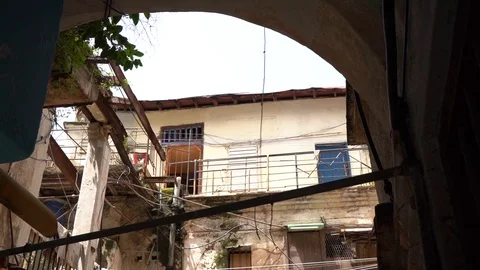View Of Building Courtyard With Rope Pulling Up Empty Bags. Low Angle, Video stock 118661832