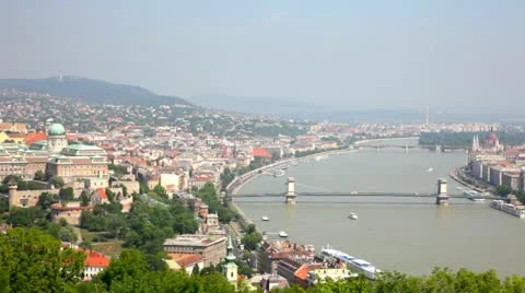 View of a building of the Hungarian parliament, Danube and chain Secheni Bridge Stock Footage